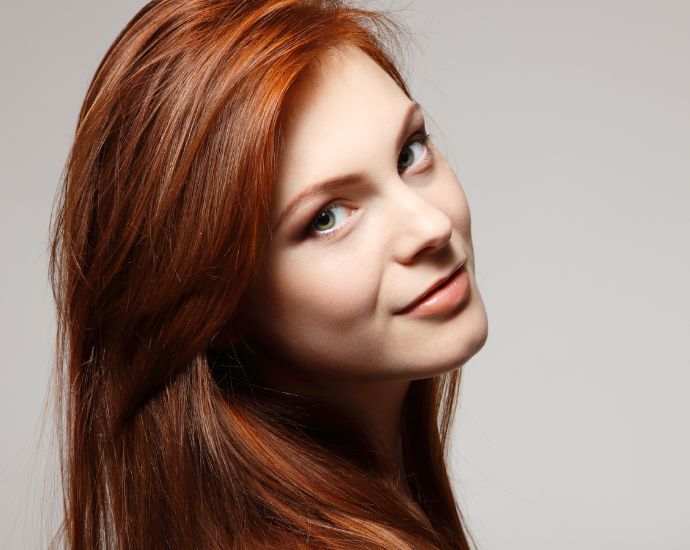 Woman with refined facial features showcasing results of anglo-caucasian rhinoplasty emphasizing natural nose balance.