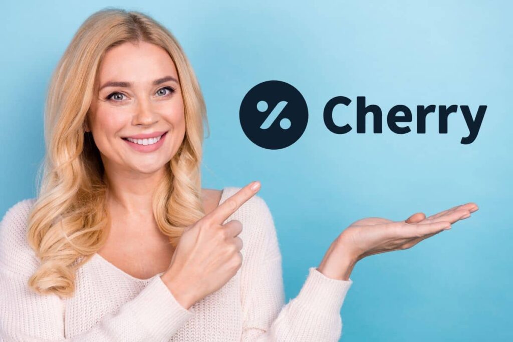 Smiling woman pointing at Cherry Financing logo promoting flexible payment options for cosmetic procedures