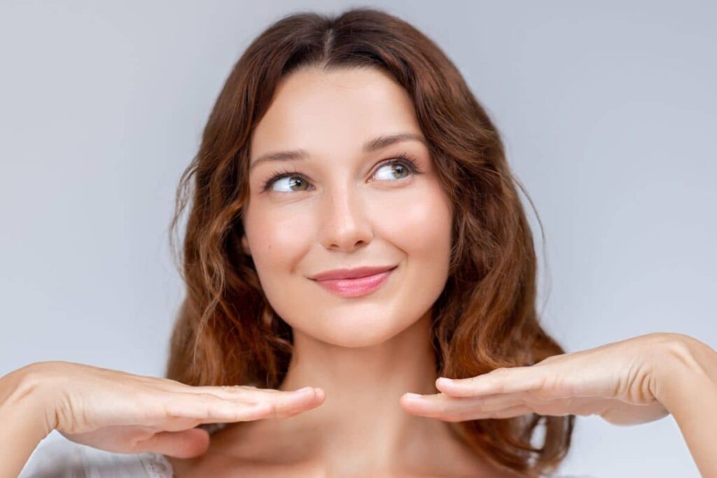 Woman with radiant, youthful skin smiling softly, reflecting subtle and evidence-based Botox treatment results.