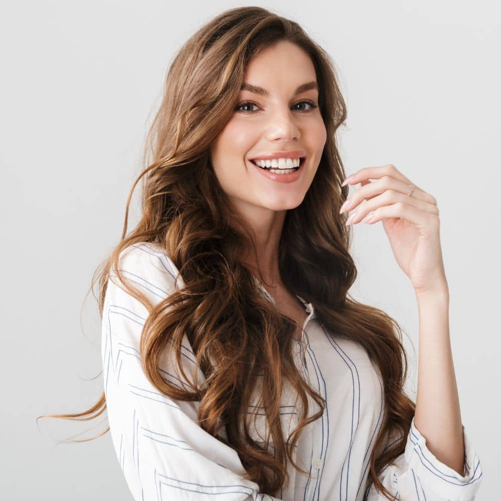 Woman with healthy glowing skin representing results of PRF facial rejuvenation treatment and improved skin quality.