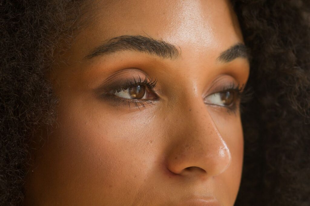 Close-up of eyes highlighting balanced eyelid appearance and natural facial harmony after blepharoplasty