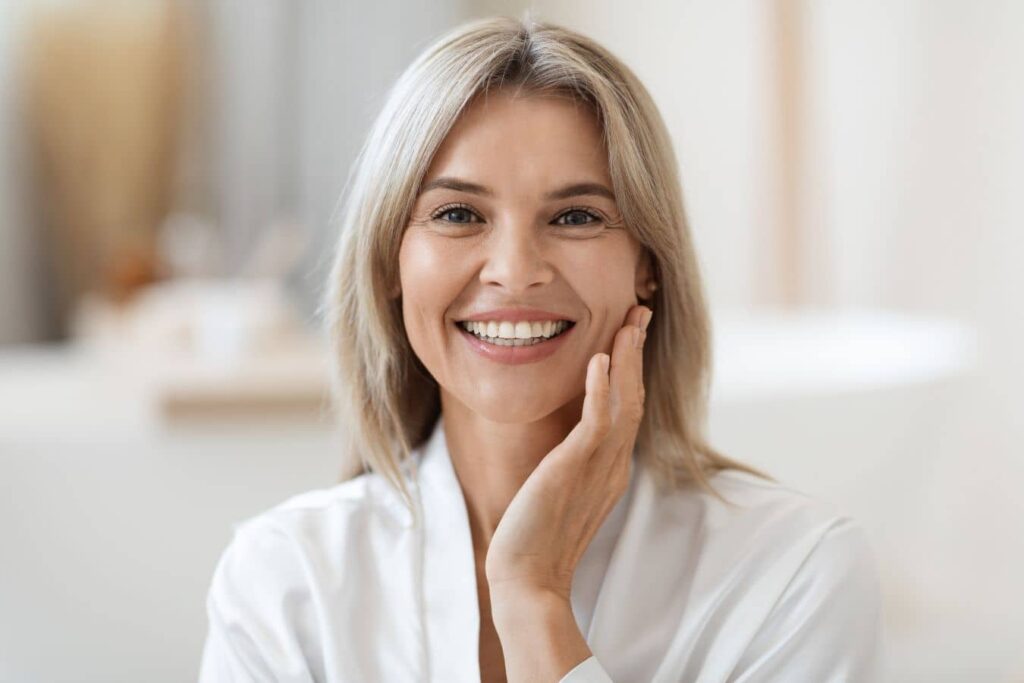 Woman with glowing skin representing UltraClear laser resurfacing and advanced skin rejuvenation treatment.