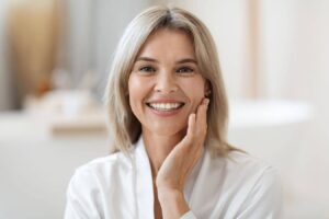 Woman with glowing skin representing UltraClear laser resurfacing and advanced skin rejuvenation treatment.