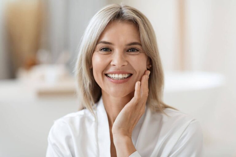 Woman with glowing skin after laser resurfacing