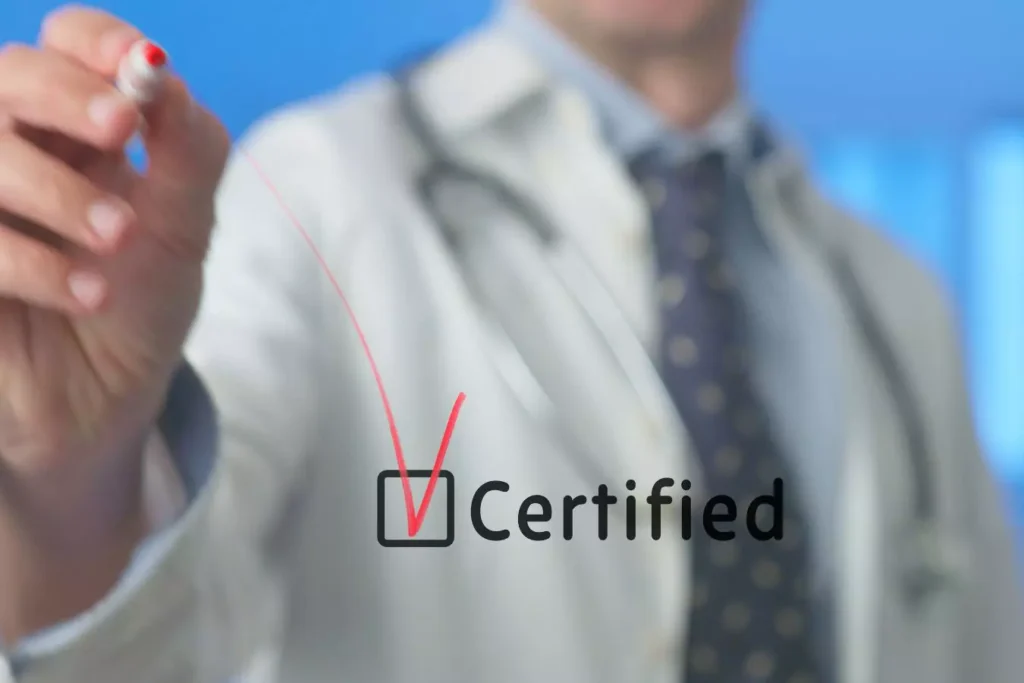 Doctor marking certified status, representing board certification standards.